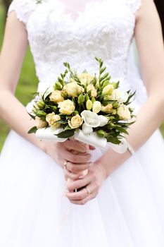 wedding bouquet in bride's hands