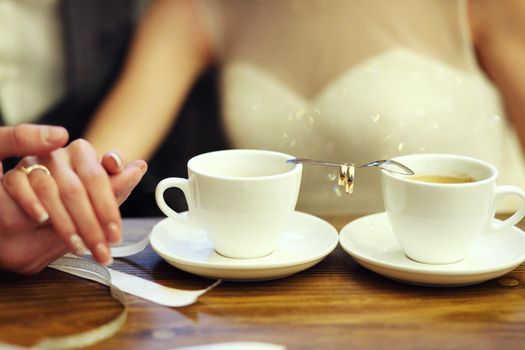 Coffee time, coffee break. Wedding day. Couple in cafe