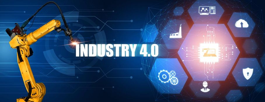 Smart industry robot arms for digital factory production technology showing automation manufacturing process of the Industry 4.0 or 4th industrial revolution and IOT software to control operation .