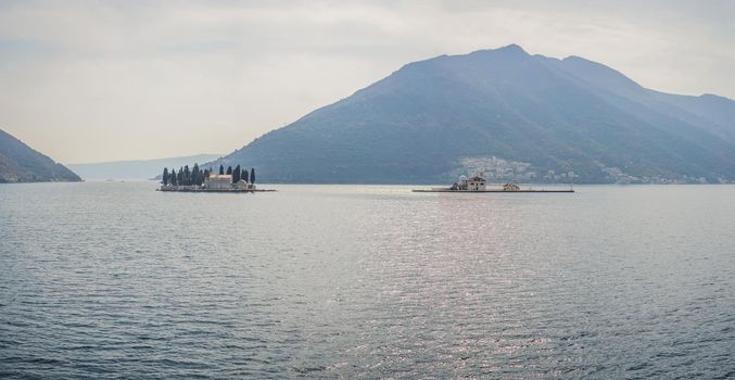 St George Island in the Bay of Kotor at Perast in Montenegro, with St George Benedictine Monastery. St. George Island, is a small natural island off the coast of Perast in Bay of Kotor, Montenegro.