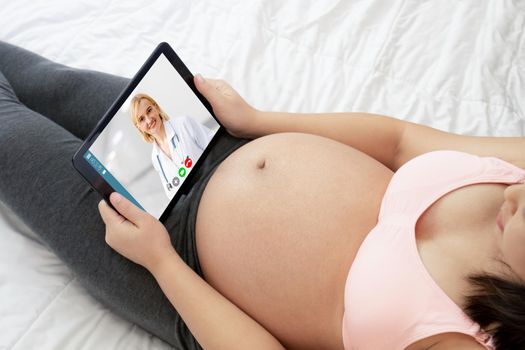 Doctor telemedicine service online video with pregnant woman for prenatal care . Remote doctor healthcare consultant from home using online mobile device connect to internet for live video call .