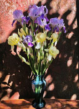Romantic bouquets of flowers. Home decor and flowers arranging. In composition used colorful irises