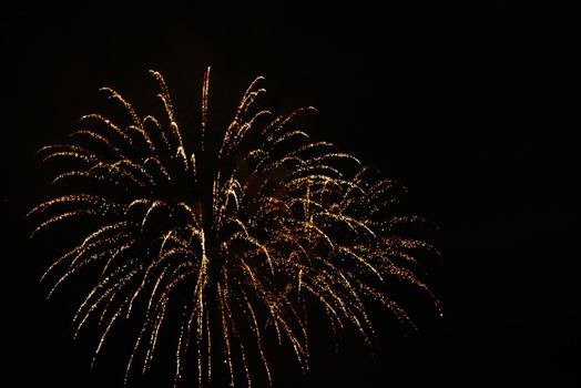 Golden salute Isolated on a black background. Celebrating July 4th - Independence Day. Copy space for your text.