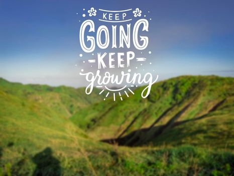 motivational phrases keep going keep growing, image of a hill with motivational messages keep going, keep growing