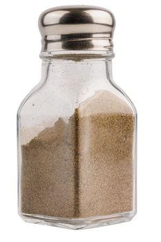 glass pepper pot with powdered black pepper inside isolated on white background with clipping path