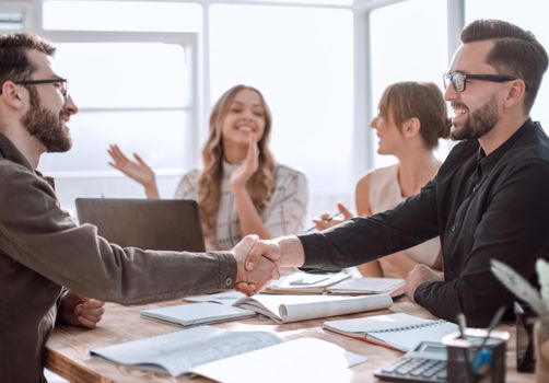 business colleagues discussing work issues in the workplace. office weekdays