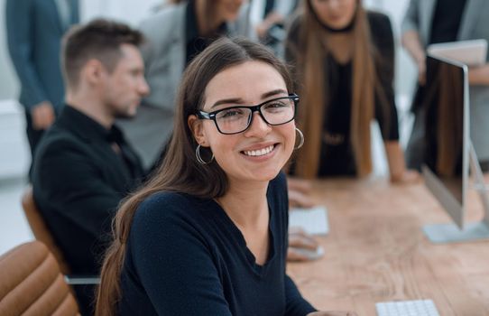 portrait of a young business woman at the workplace in the office