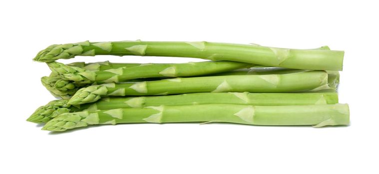 bunch of fresh raw asparagus on white isolated background, close up