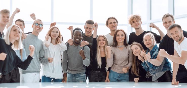 close up. large group of happy young people standing together