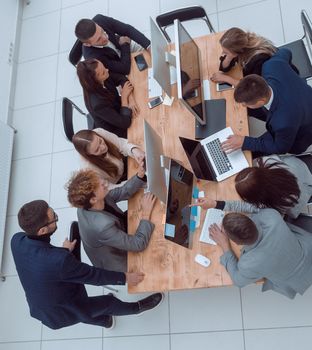 top view. business team discussing at a working meeting. business concept