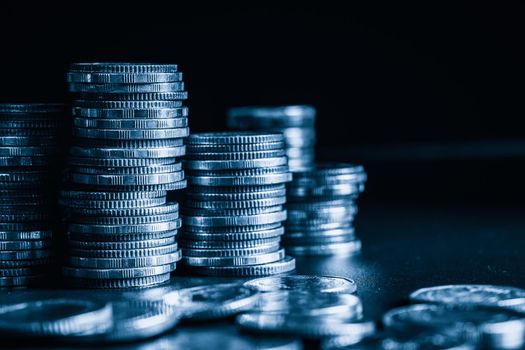 Pile of gold coins stack in finance treasury deposit bank account for saving . Concept of corporate business economy and financial growth by investment in valuable asset to gain cash revenue profit .