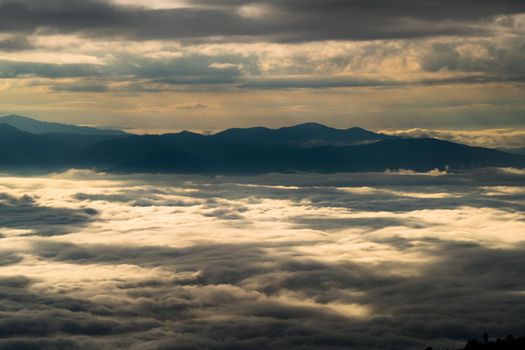 Cloudscape under the mountain horizon