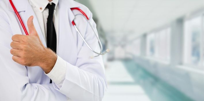 Young male doctor working at the hospital. Medical healthcare and doctor staff service.