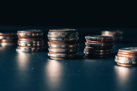 Pile of gold coins stack in finance treasury deposit bank account for saving . Concept of corporate business economy and financial growth by investment in valuable asset to gain cash revenue profit .