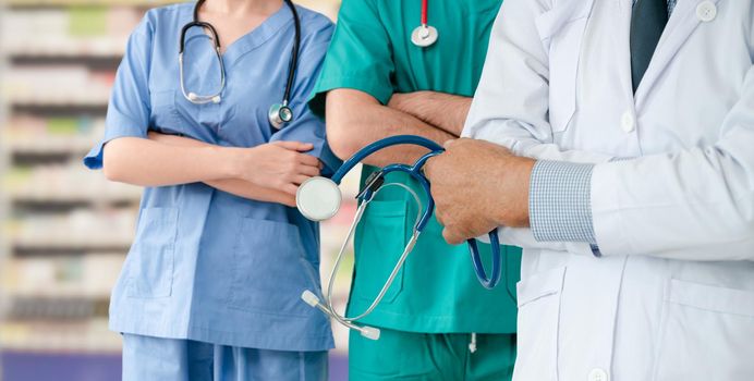 Healthcare people group. Professional doctor working in hospital office or clinic with other doctors, nurse and surgeon. Medical technology research institute and doctor staff service concept.