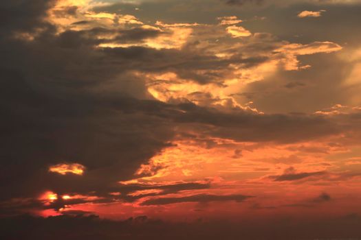 photograph of the sunrise from the sea and the beautiful sky and morning clouds