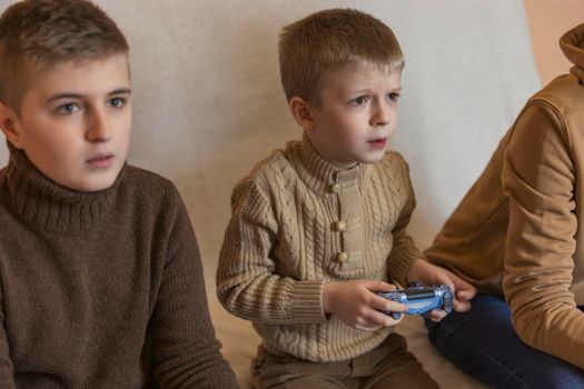 children playing console with joysticks