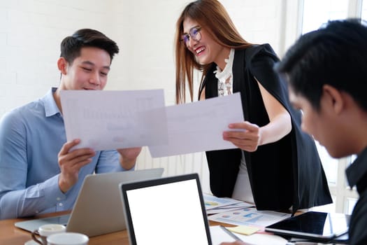 executive businesswoman advising analyzing discussing business project with co-worker team