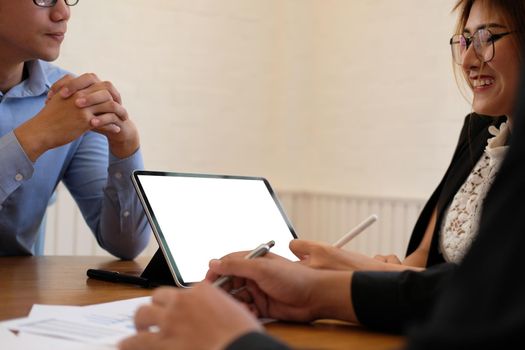 businesswoman working discussing with colleague. business people have a meeting. businessman working on startup project with co-worker team.