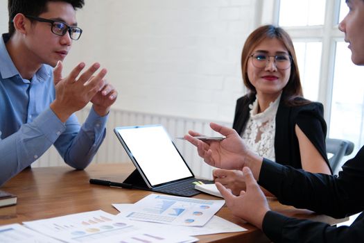 businesswoman working discussing with colleague. business people have a meeting. businessman working on startup project with co-worker team.