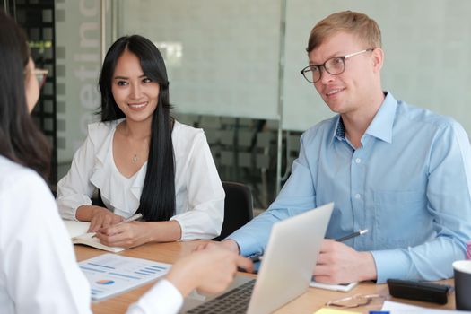 business people discussing on performance revenue in meeting. businessman working with co-worker team. financial adviser analyzing data with investor.