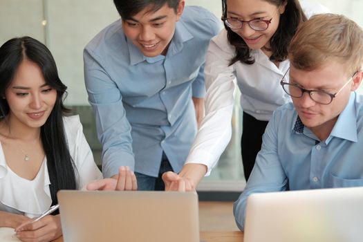 business people discussing on performance revenue in meeting. businessman working with co-worker team. financial adviser analyzing data with investor.