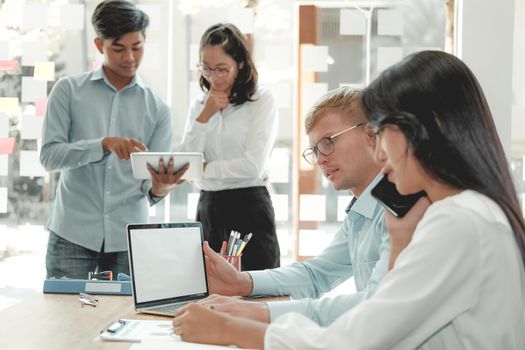 business people discussing on performance revenue in meeting. businessman working with co-worker team. financial adviser analyzing data with investor.