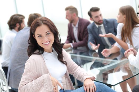 young business woman sitting at corporate business team meeting . the concept of teamwork