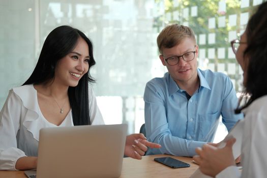 business people discussing on performance revenue in meeting. businessman working with co-worker team. financial adviser analyzing data with investor.