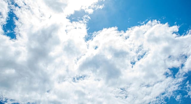 Blue sky with clouds selective focus nature