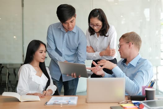 business people discussing on performance revenue in meeting. businessman working with co-worker team. financial adviser analyzing data with investor.