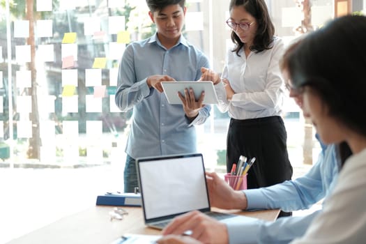 business people discussing on performance revenue in meeting. businessman working with co-worker team. financial adviser analyzing data with investor.