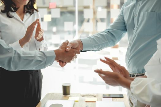 businessman shaking hands after meeting. Business people handshaking. Greeting deal, teamwork partnership concept.