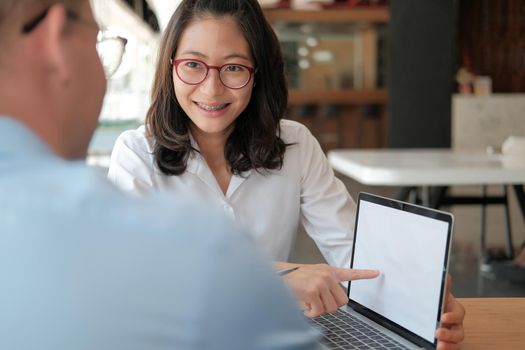 business people discussing on performance revenue in meeting. businessman working with co-worker team. financial adviser analyzing data with investor.