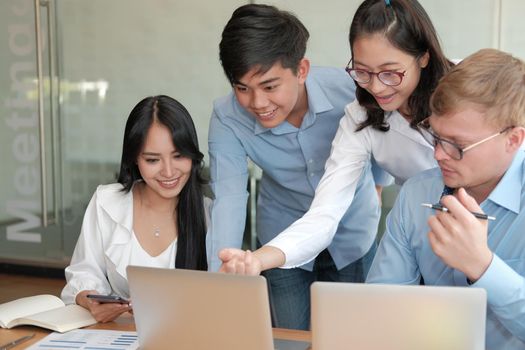 business people discussing on performance revenue in meeting. businessman working with co-worker team. financial adviser analyzing data with investor.