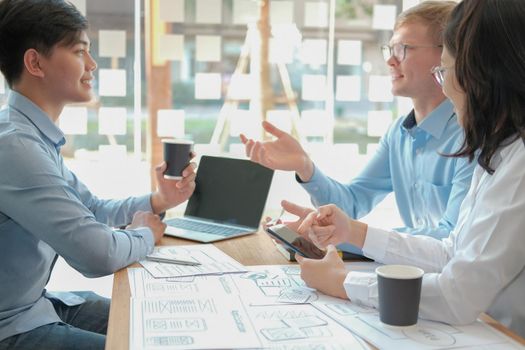 user experience UX designer designing web on smart phone layout. UI planning mobile application. developer work with business prototype