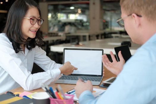 business people discussing on performance revenue in meeting. businessman working with co-worker team. financial adviser analyzing data with investor.