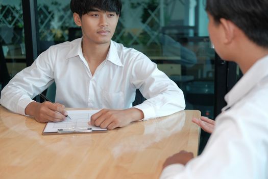 human resource manager interviewing candidate for job vacancy. applicant explaining profile for career recruitment