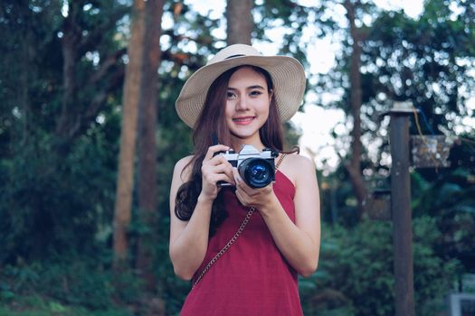 asian woman take photo. traveler tourist travel on holiday vacation. journey trip concept