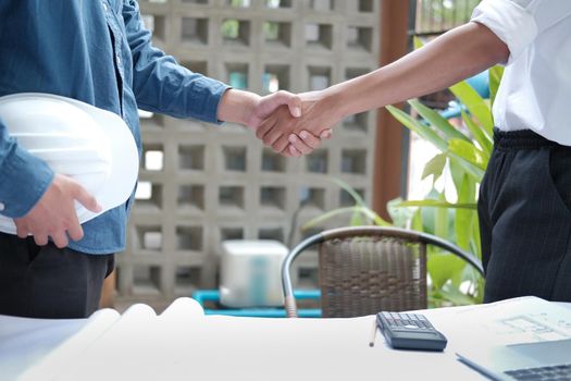 architect shaking hands after meeting. engineer handshaking after conference. Greeting deal, teamwork partnership cooperate concept.