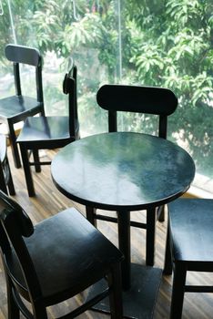 many empty chair at cafe during corona virus period .