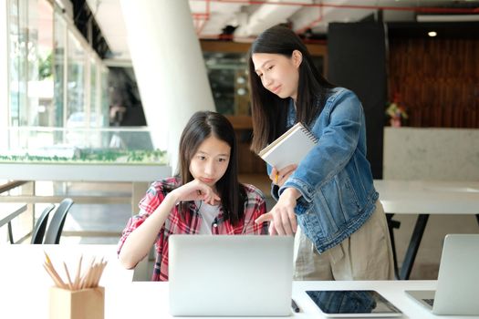 girl teenager college high school student studying with computer laptop