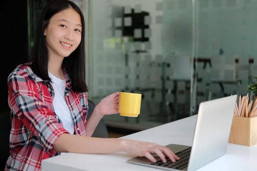 girl teenager college high school student studying with computer laptop