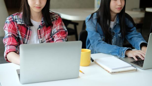 girl teenager college high school student studying with computer laptop