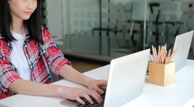 girl teenager college high school student studying with computer laptop