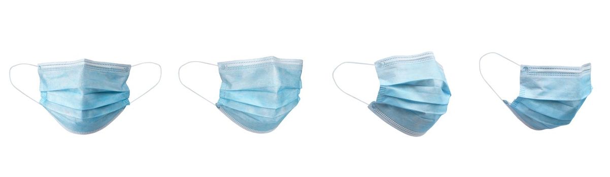 Medical face mask isolated on white background with clipping path around the face mask and the ear rope. Concept of COVID-19 or Coronavirus Disease 2019 prevention by wearing face mask.