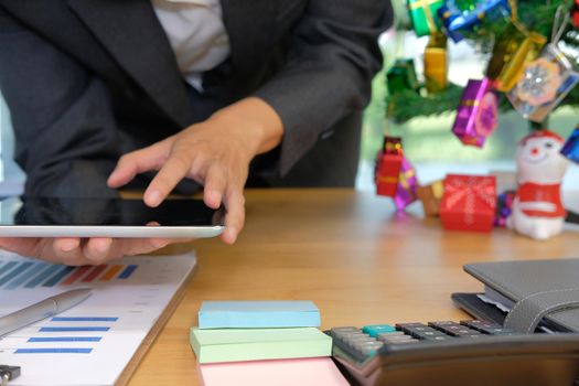 startup man businessman working with tablet during christmas new year holiday