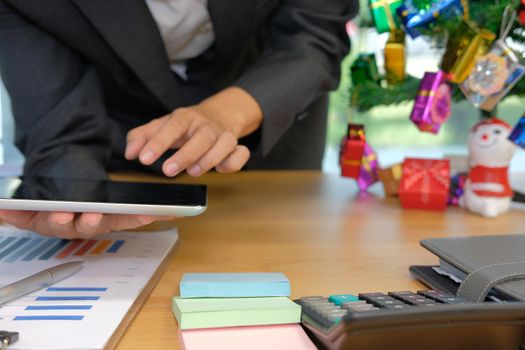 startup man businessman working with tablet during christmas new year holiday