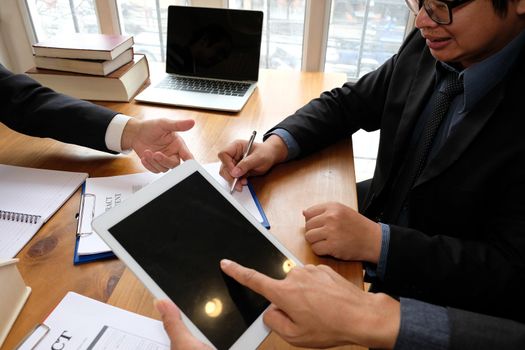businessman consulting lawyer & signing contract agreement. team meeting at law firm