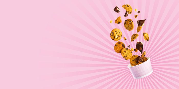 Cookies levitation. falling cookies. Cookies broken in pieces with crumbs. Flying Chocolate cookies